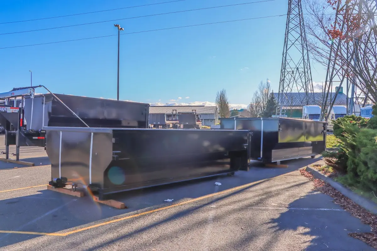 Roll-off dumpster ready for waste disposal at job site for Demolition Dumpster Rental in Richland